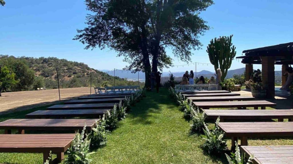 Outside ceremony setup with benches 